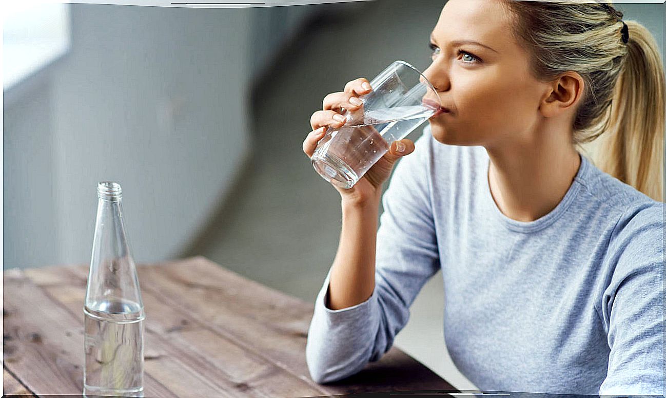 Woman drinking a glass of water