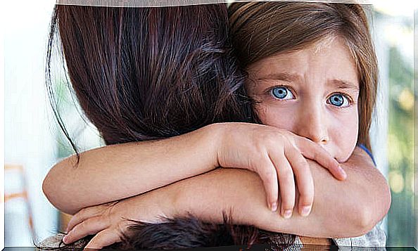 Girl hugging her mother for child attachment