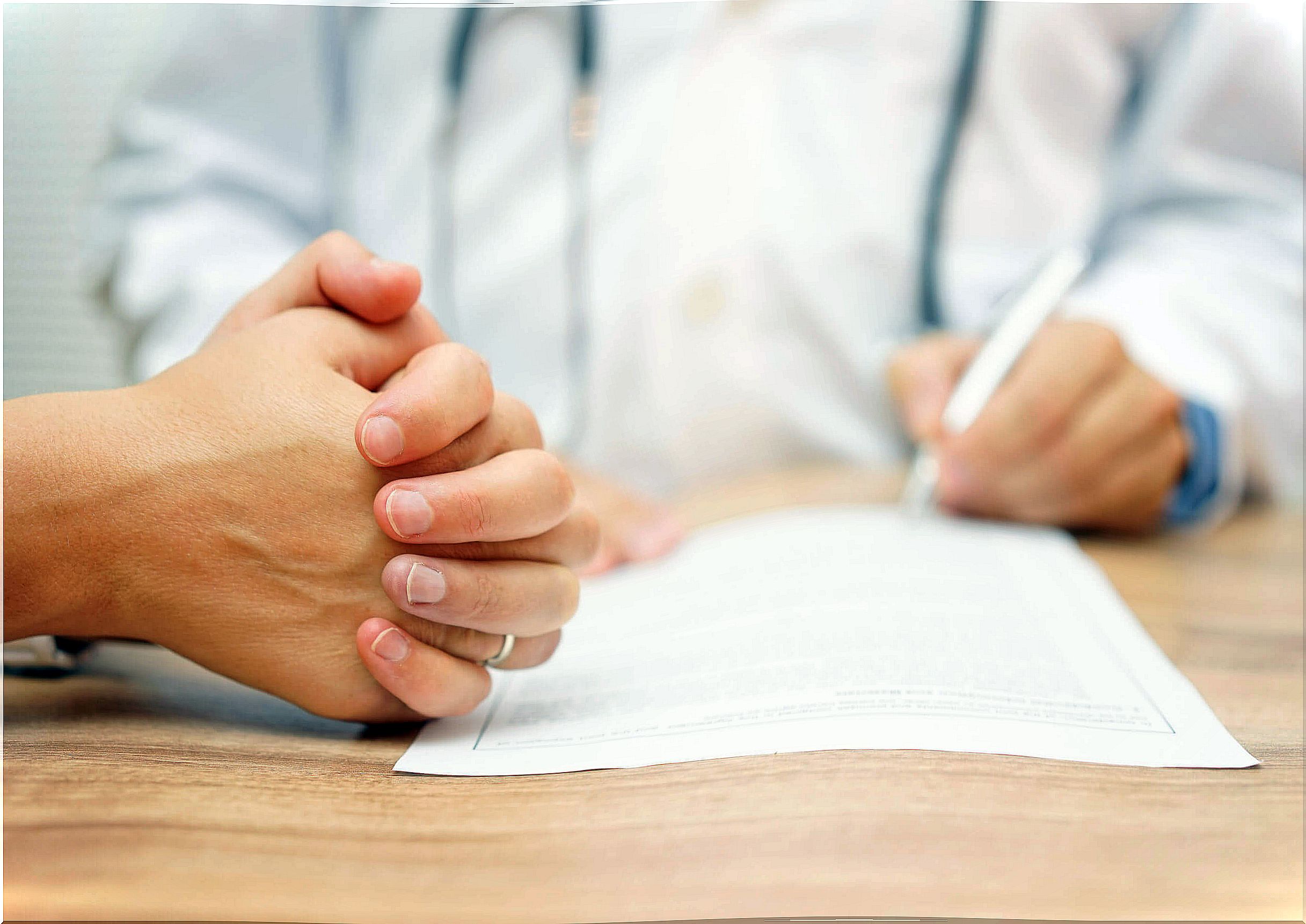 Doctor talking to his patient about treatment.