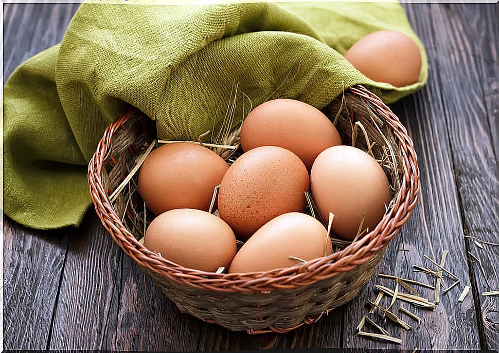 Basket of eggs with a green cloth