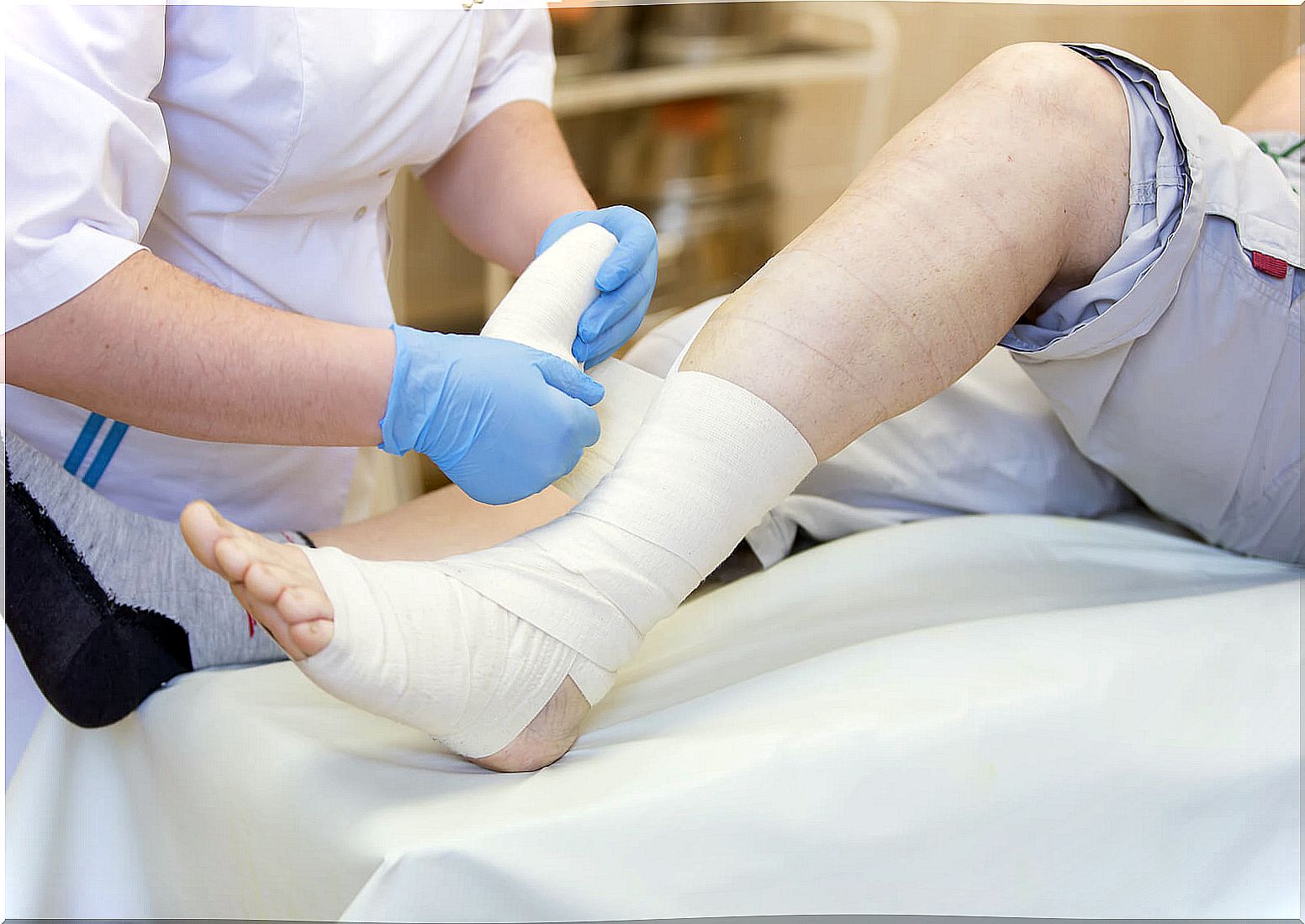 Doctor placing plaster.